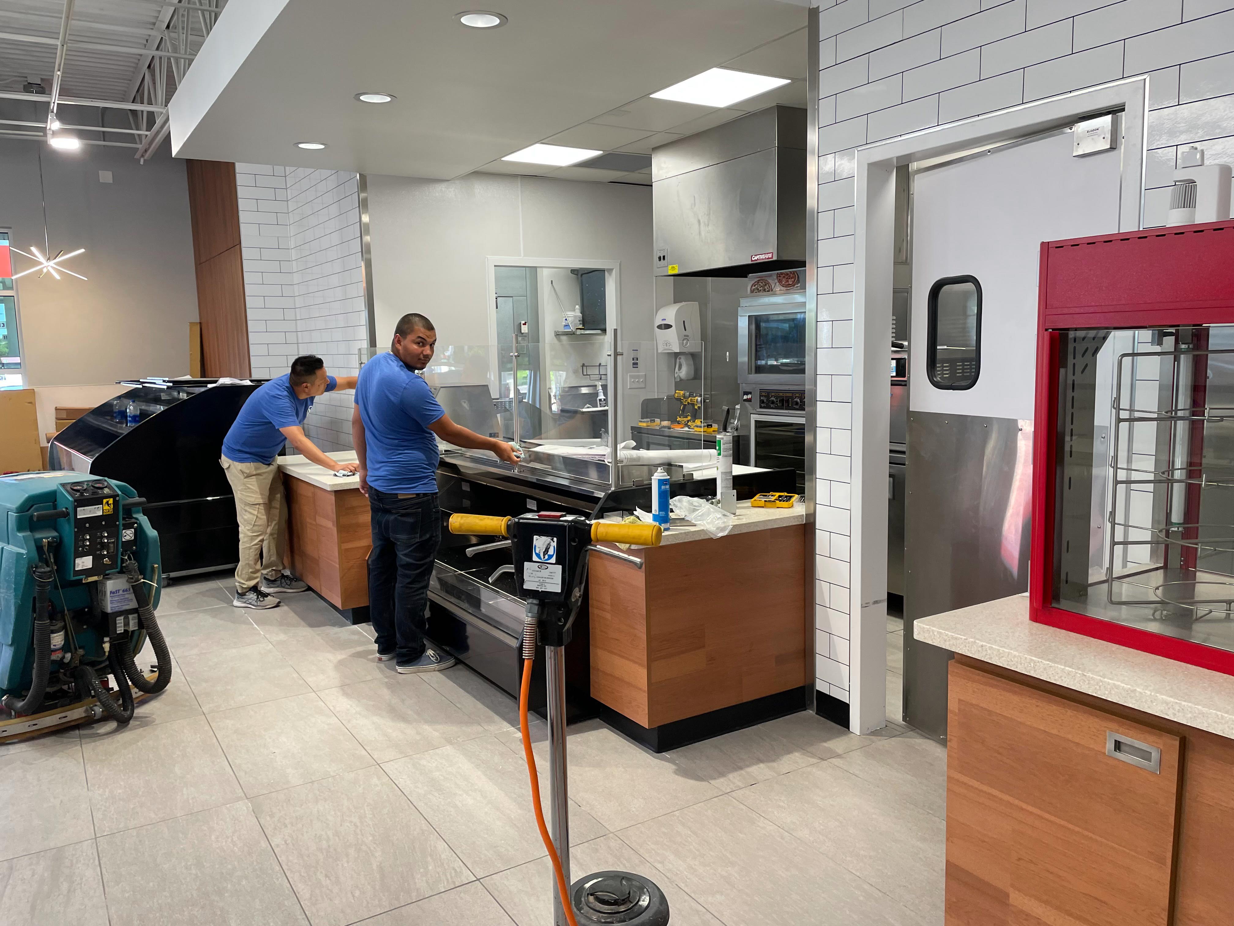 Restaurant build-out with commercial kitchen equipment and service counter installation